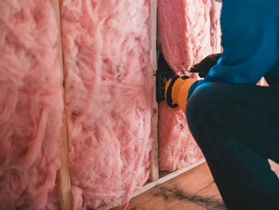 Man working on insulation